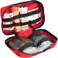Trauma first aid kit open in a red case with bleeding control dressing option.