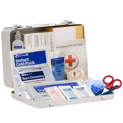 First aid kit with various supplies on a white background