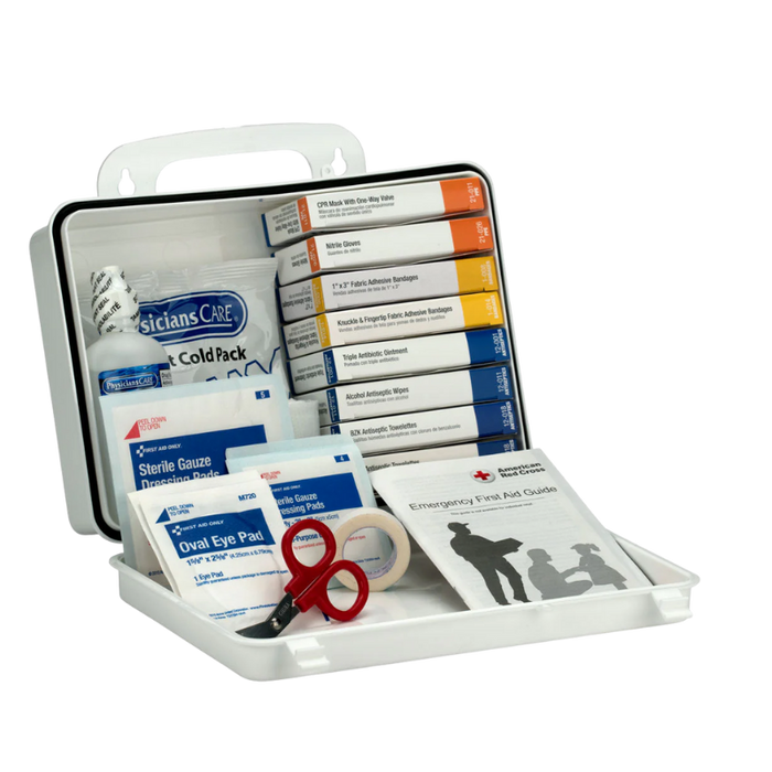 First aid kit with various supplies on a white background